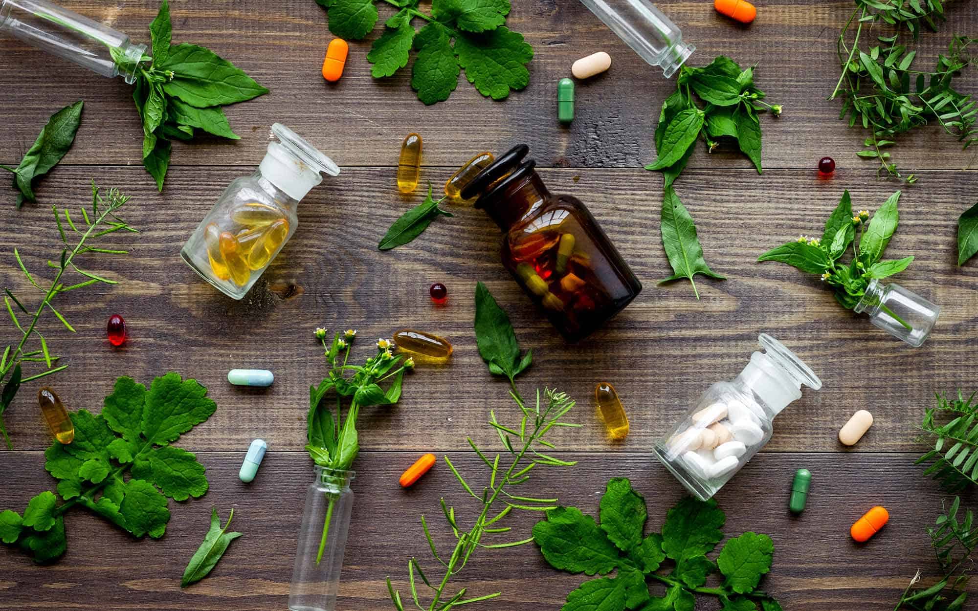 Herbal medicine Leaves bottles and pills